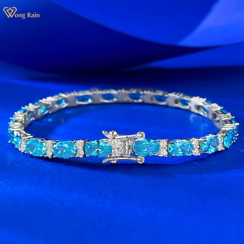 Pulseira Wong Rain em Prata 925 com Água-Marinha Oval 4x6 mm e Detalhes em Pedra de Alto Brilho